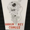 broken key comics sign