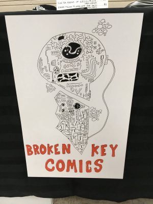broken key comics sign